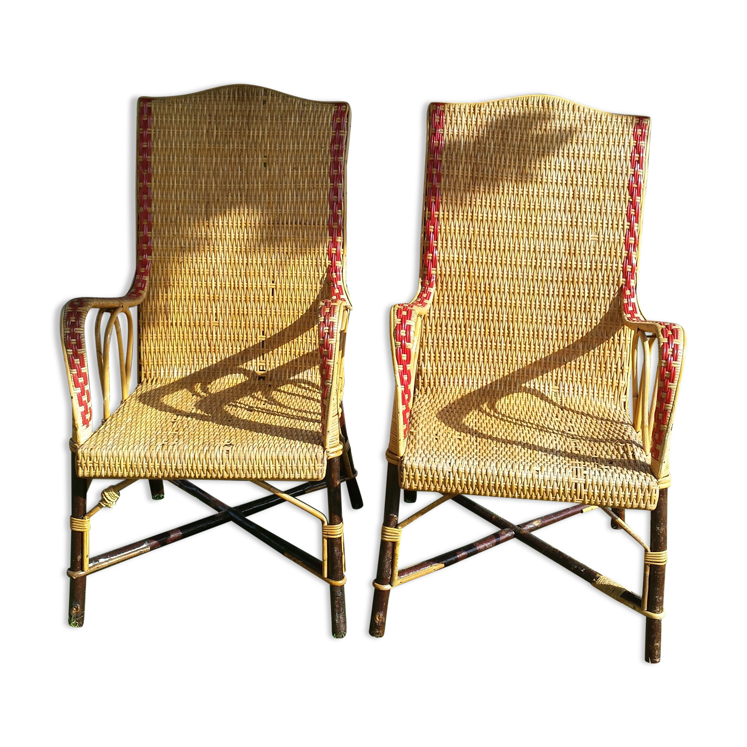 Wicker or rattan armchairs and bamboo