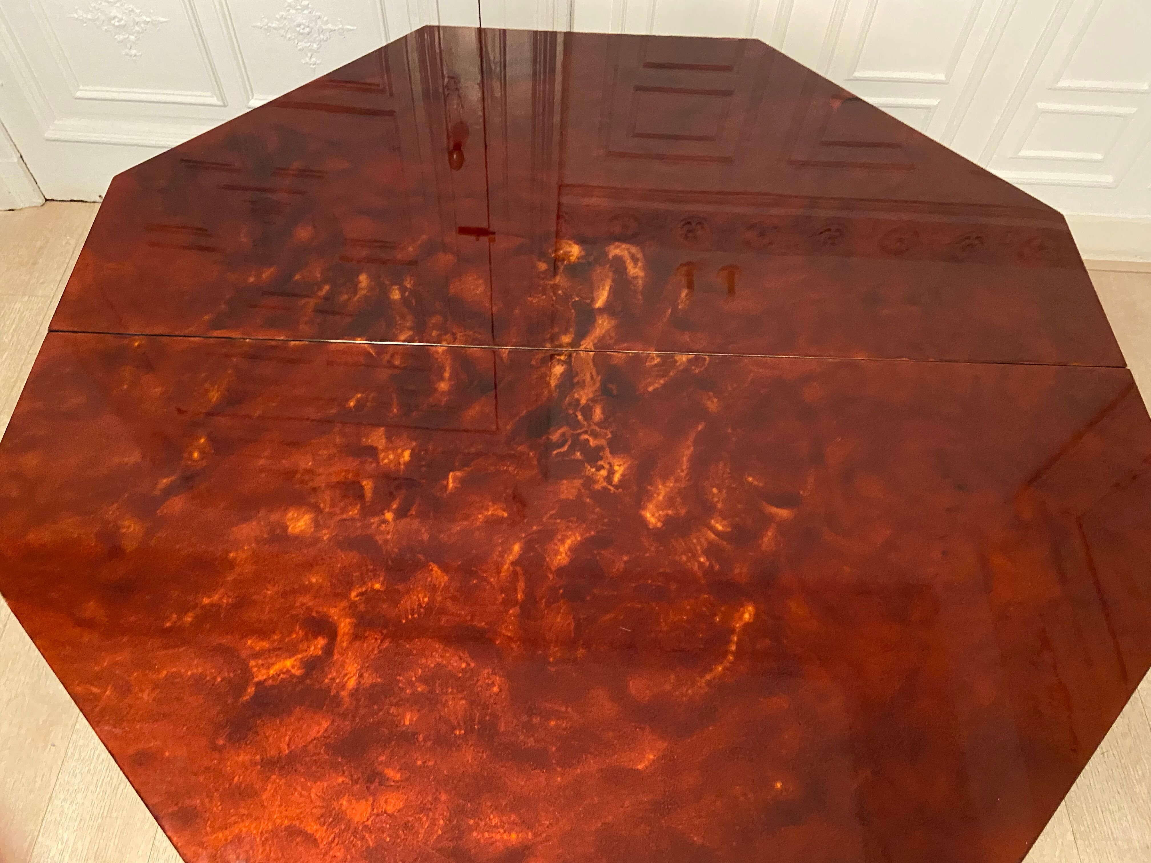 Red lacquered dining table and gold dust, 1970s