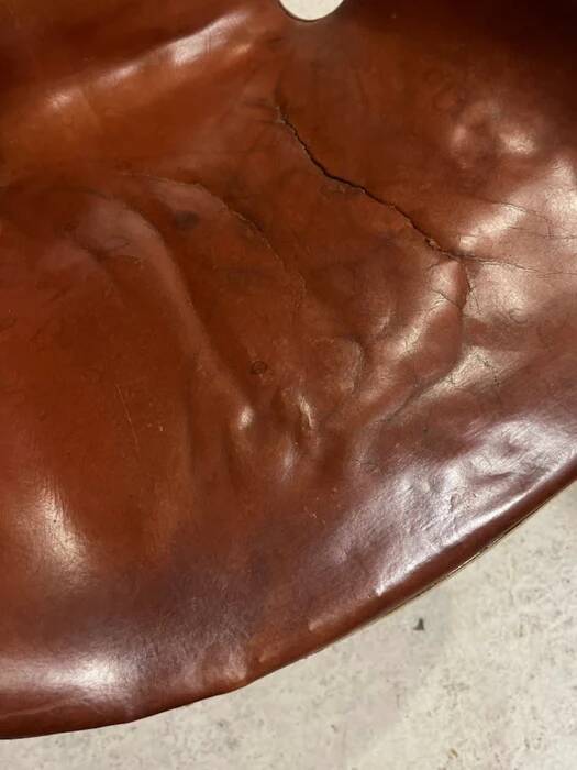 First edition Arne Jacobsen Swan chair, original patinated leather, 1950s
