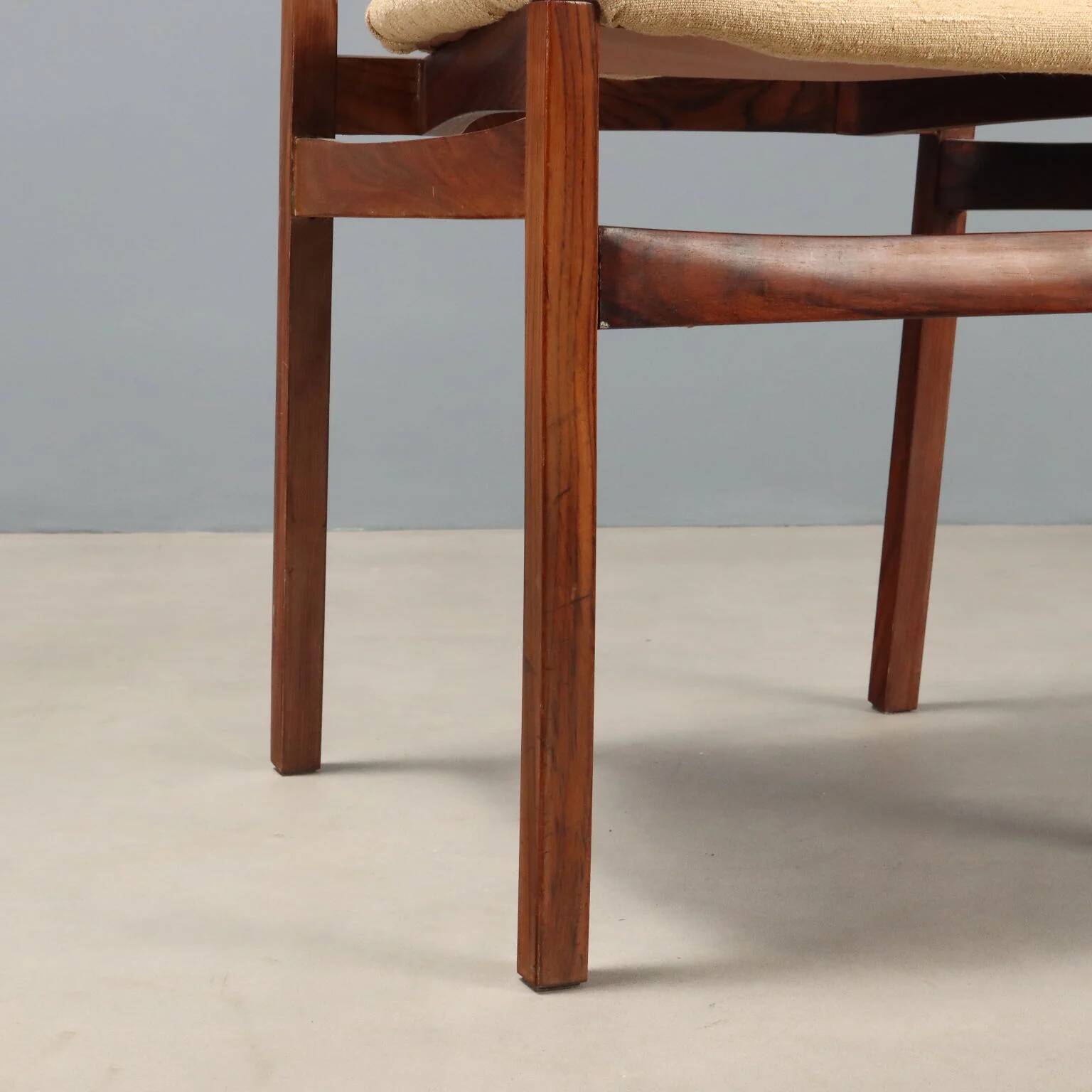 Vintage lounge chairs in exotic wood and fabric, 1960s design.