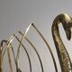 Brass swan magazine rack