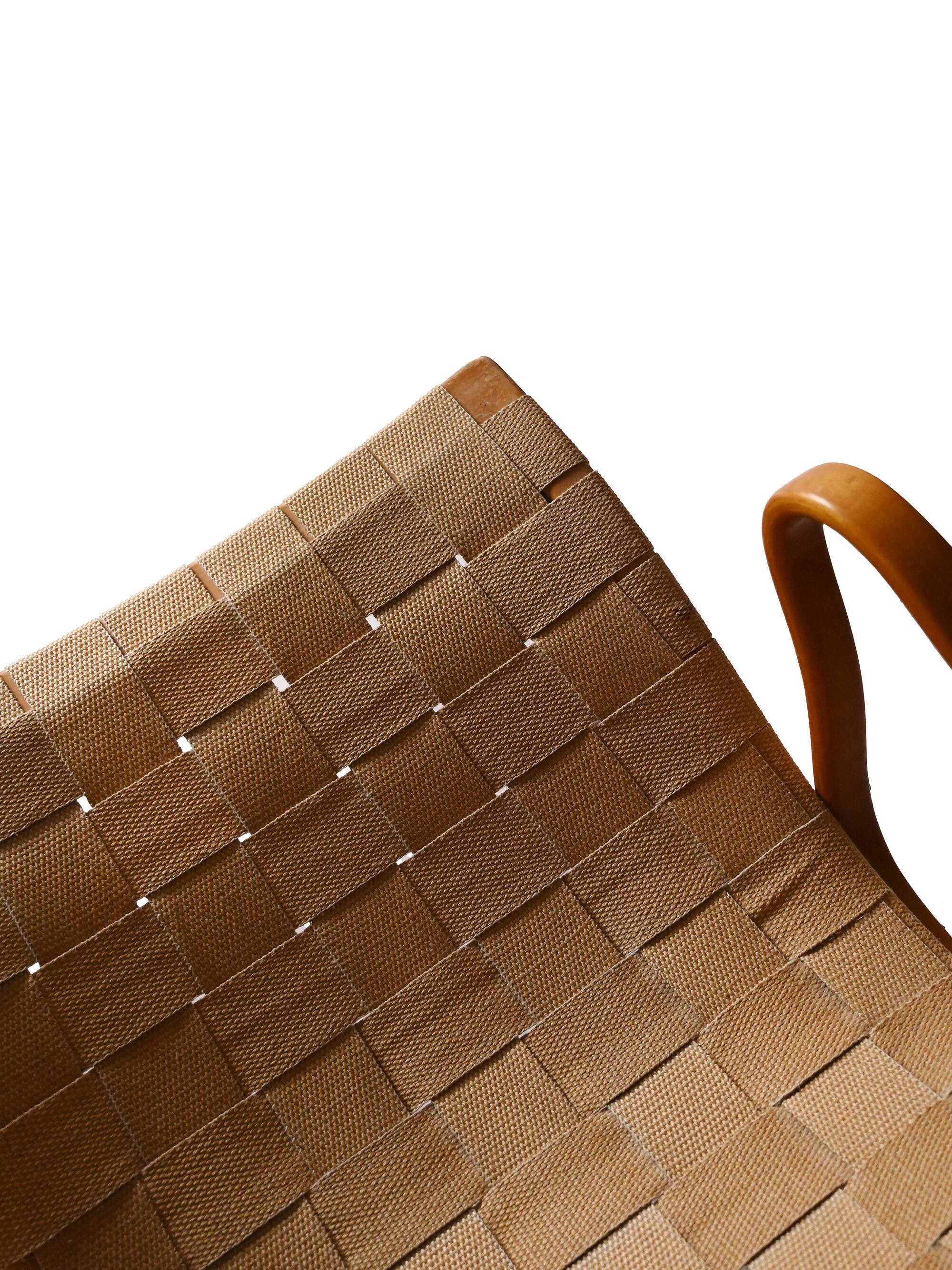 “Pernilla” armchair and footstool designed by Bruno Mathsson