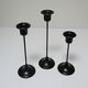 Trois bougeoirs métal laqué noir scandinaves