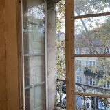 Window with interior shutters