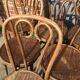 Six patinated bistro chairs