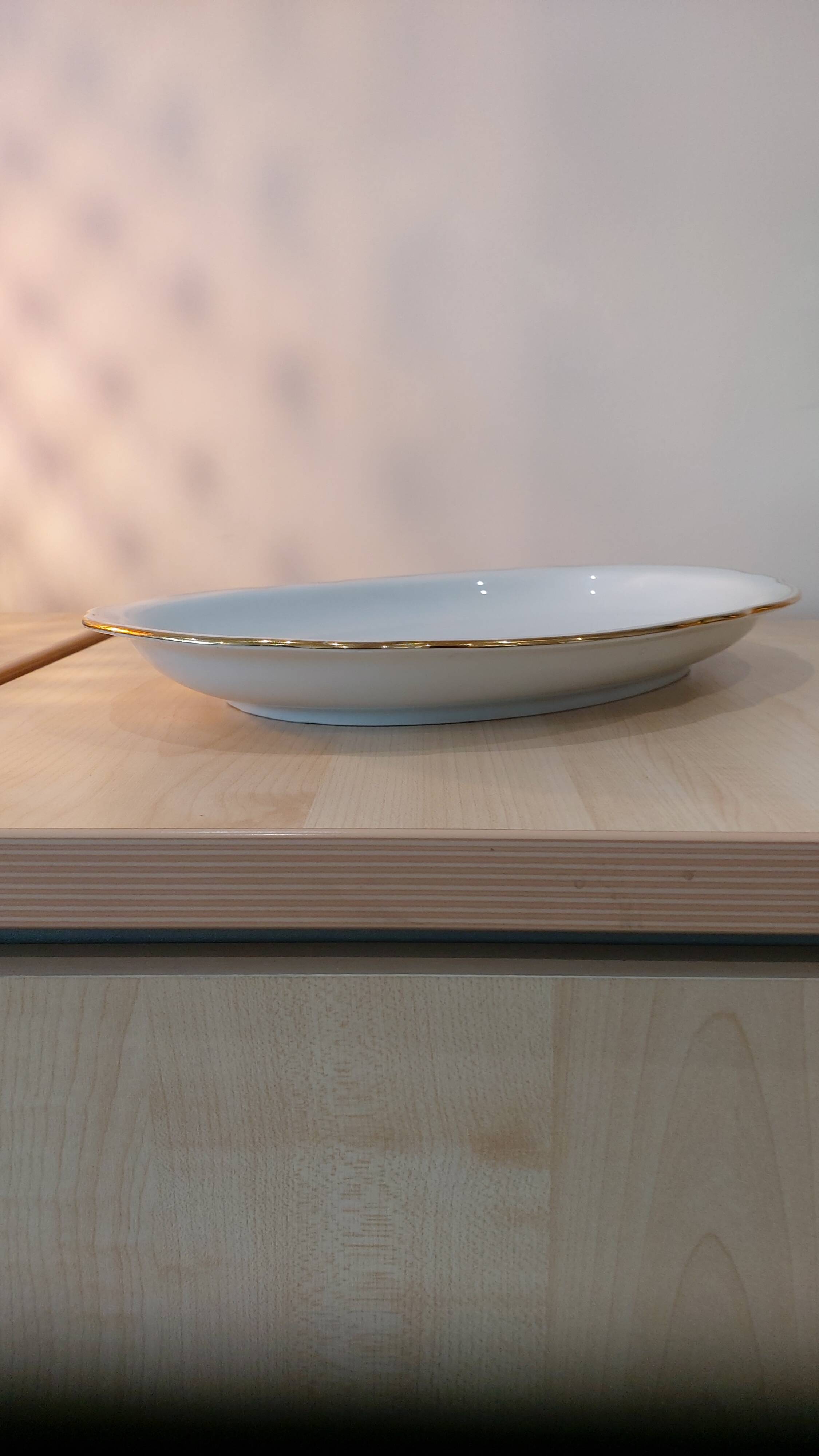 Oval porcelain plate white with gold edging