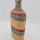 Bottle covered with wicker