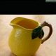 Lemon pitcher in ceramic slurry glazed yellow and green vintage