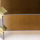 Hollywood Regency coffee table in brass and smoked glass, chic two-tier coffee table.