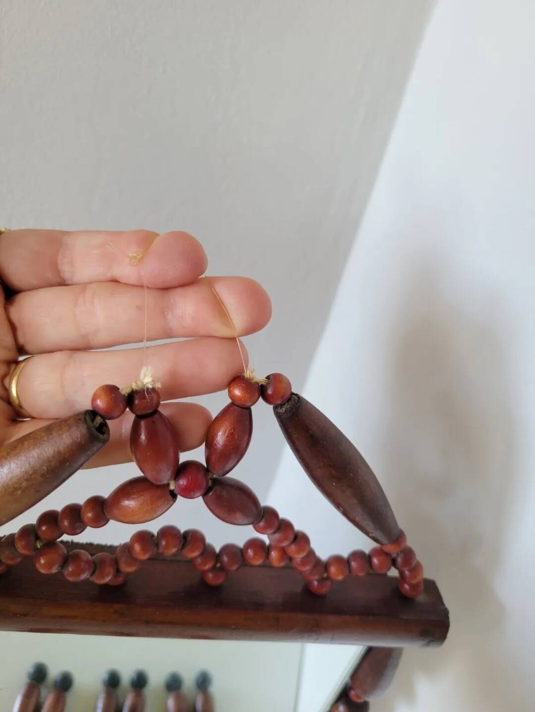 Miroir bohème vintage en perles de bois