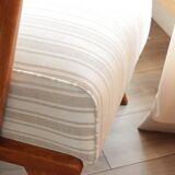 Scandinavian armchair in beige and white striped fabric