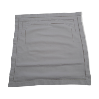 Old pair of rustic white canvas pillowcases embroidered