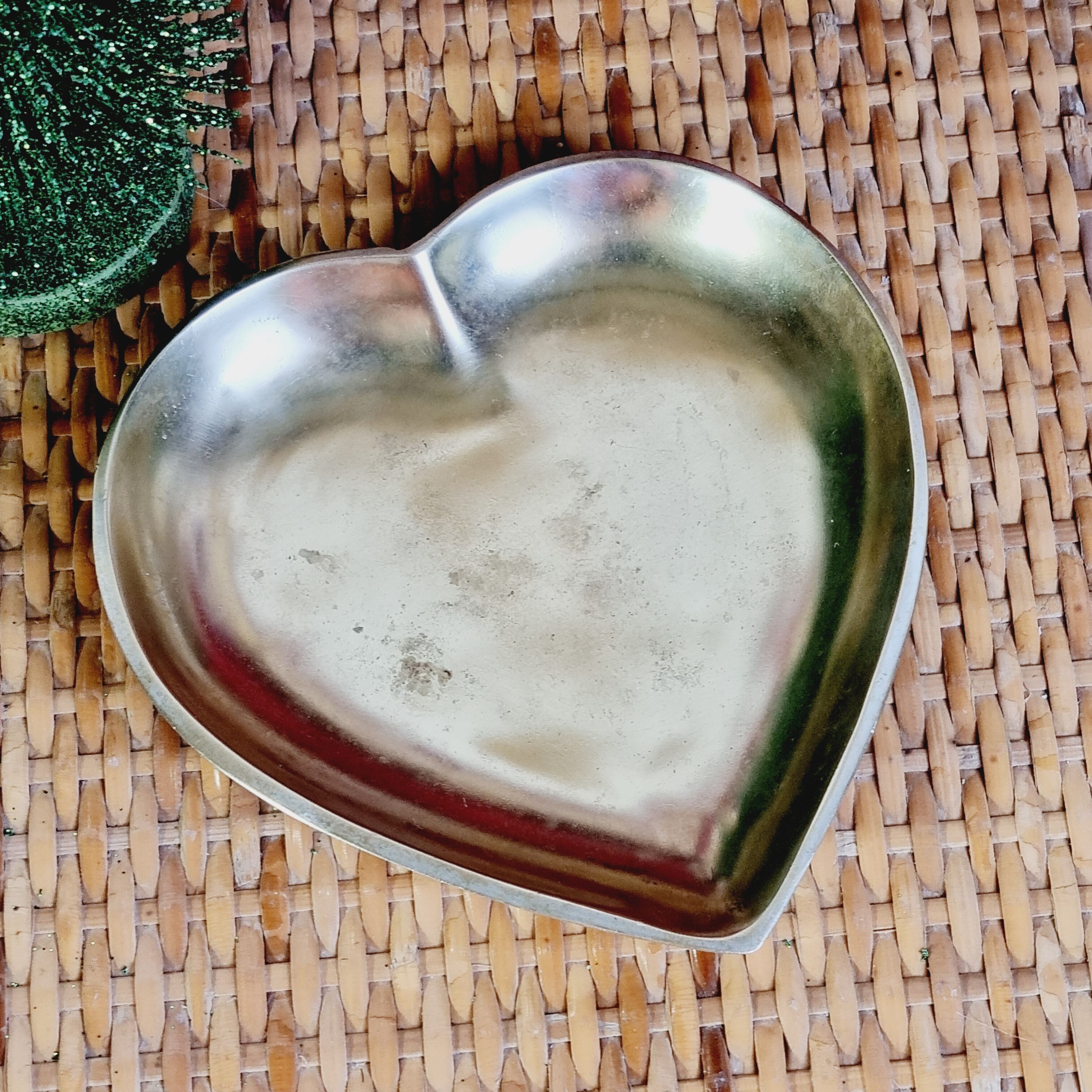 Empty brass heart pocket