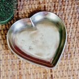 Empty brass heart pocket