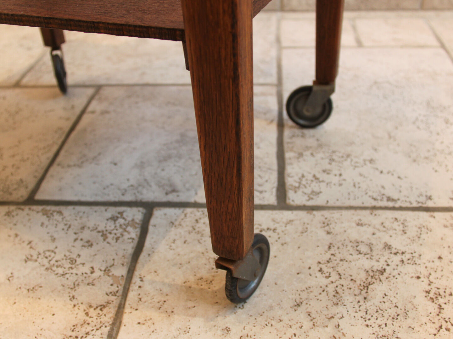 Worker green wood feet wheels