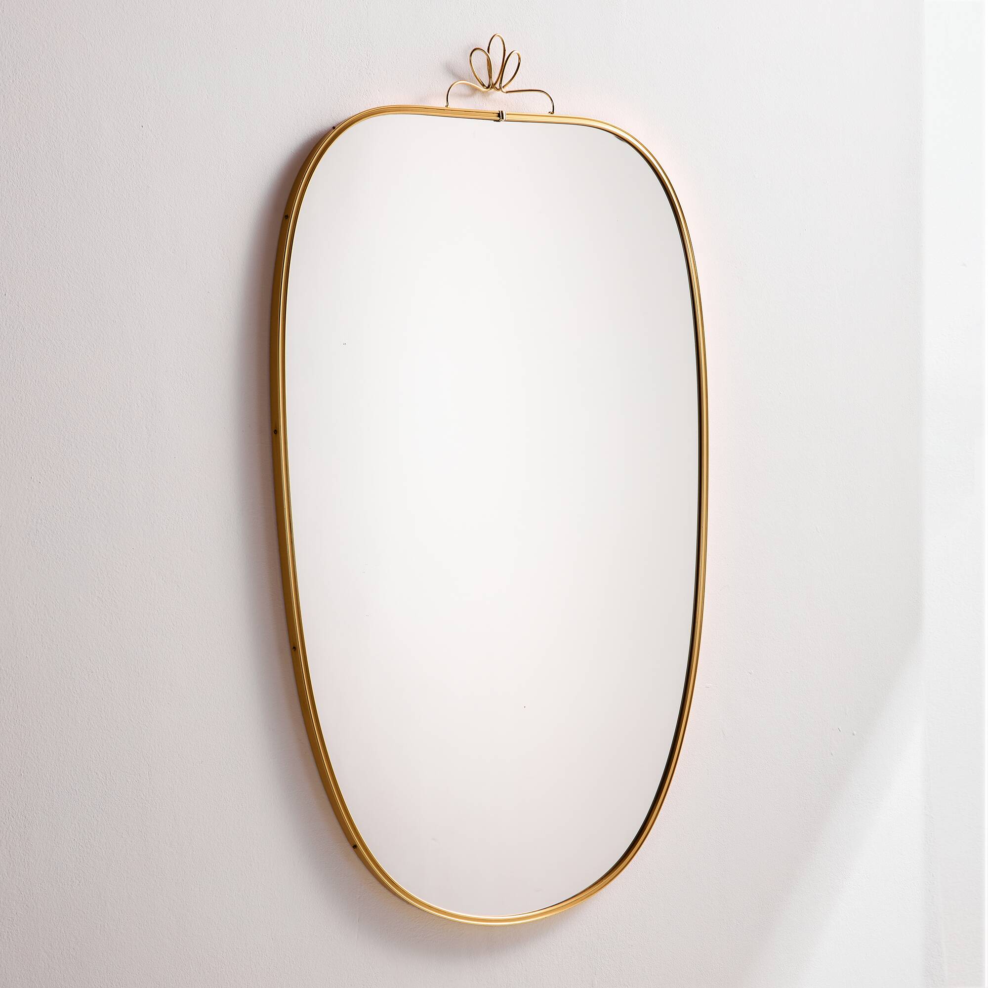 Metal and brass framed mirror