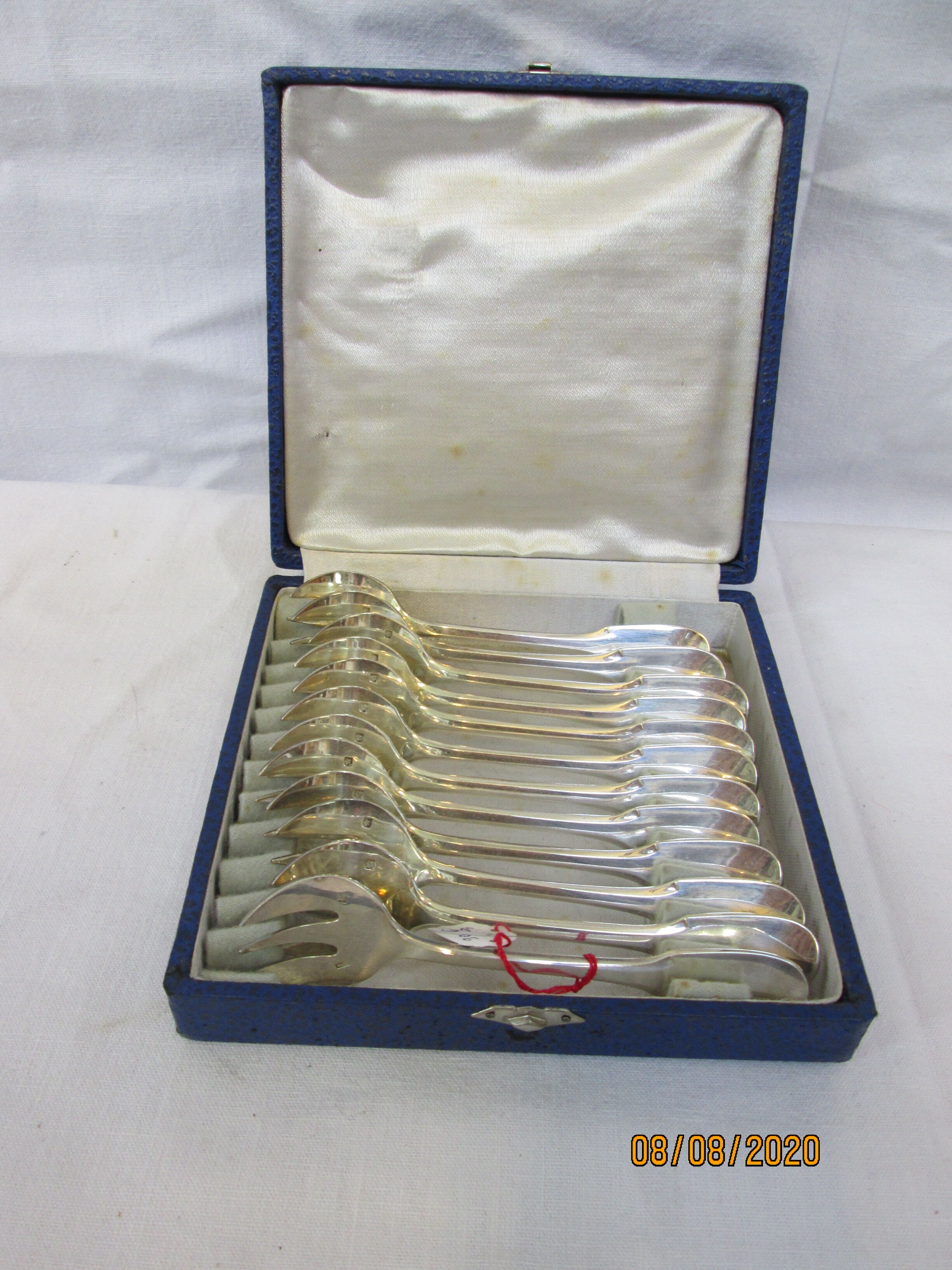12 silver metal oyster forks