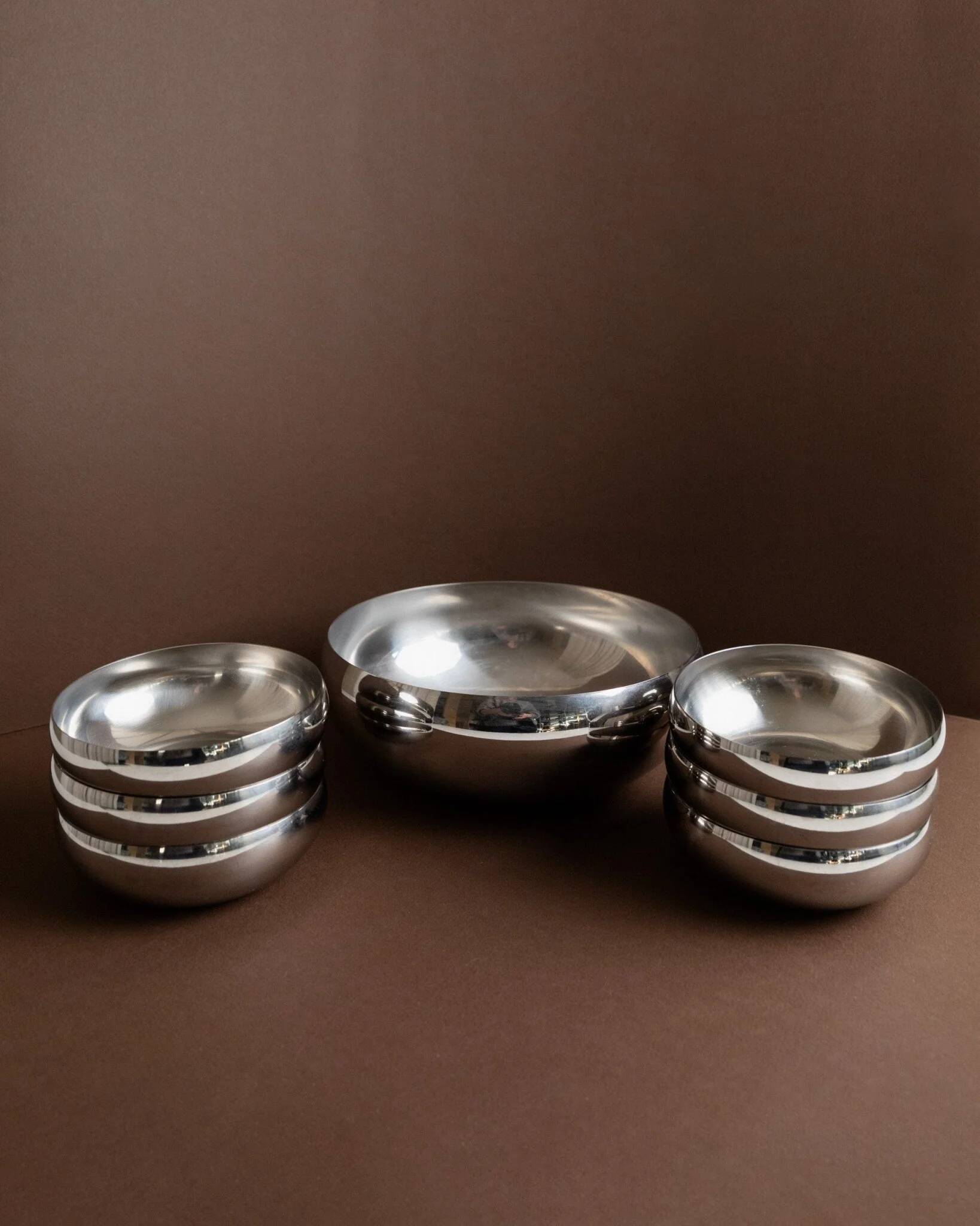 Set of 7 silver stainless steel bowls Space Age vintage Italian design stackable and elegant