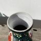 Asian vase in black ceramic with floral decoration