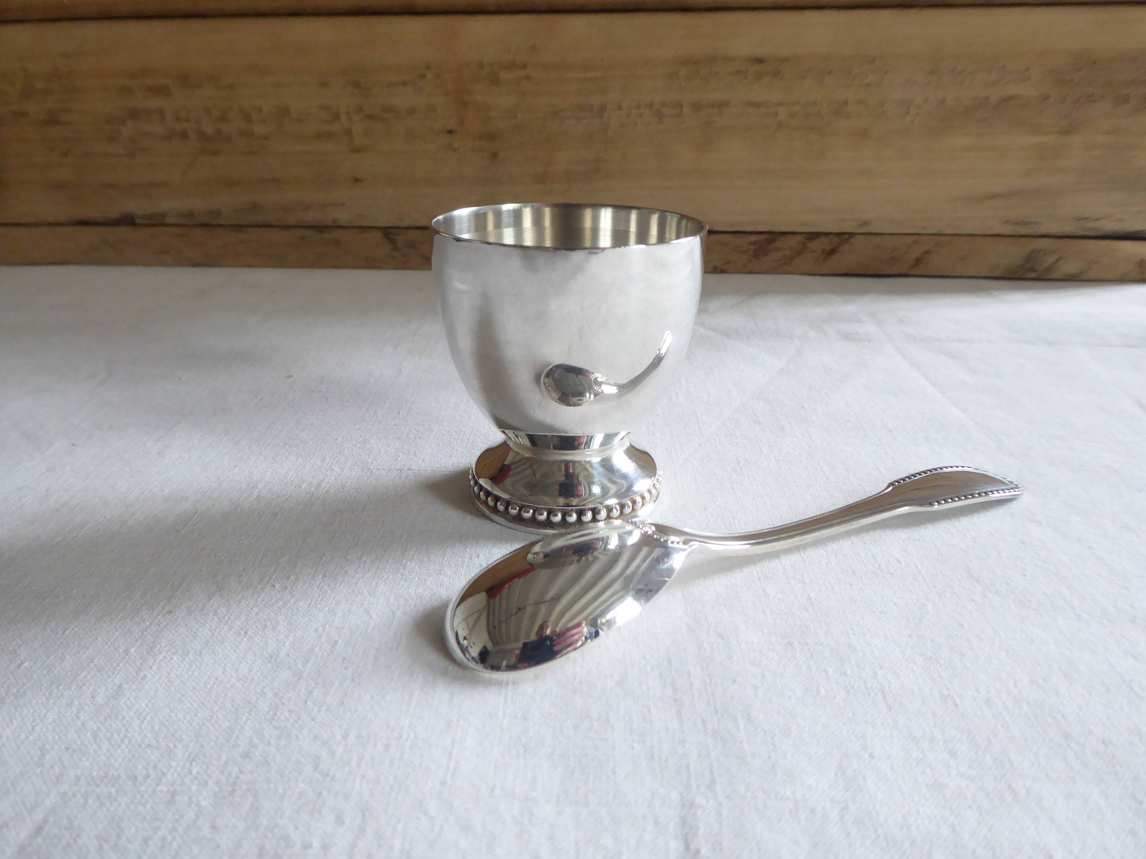 Cockerel + silver metal spoon