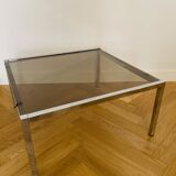 Glass and metal coffee table in the 70s