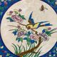 Large circular earthenware dish from Louvière with Longwy style bird decoration