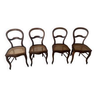 Solid walnut chairs with cane seats