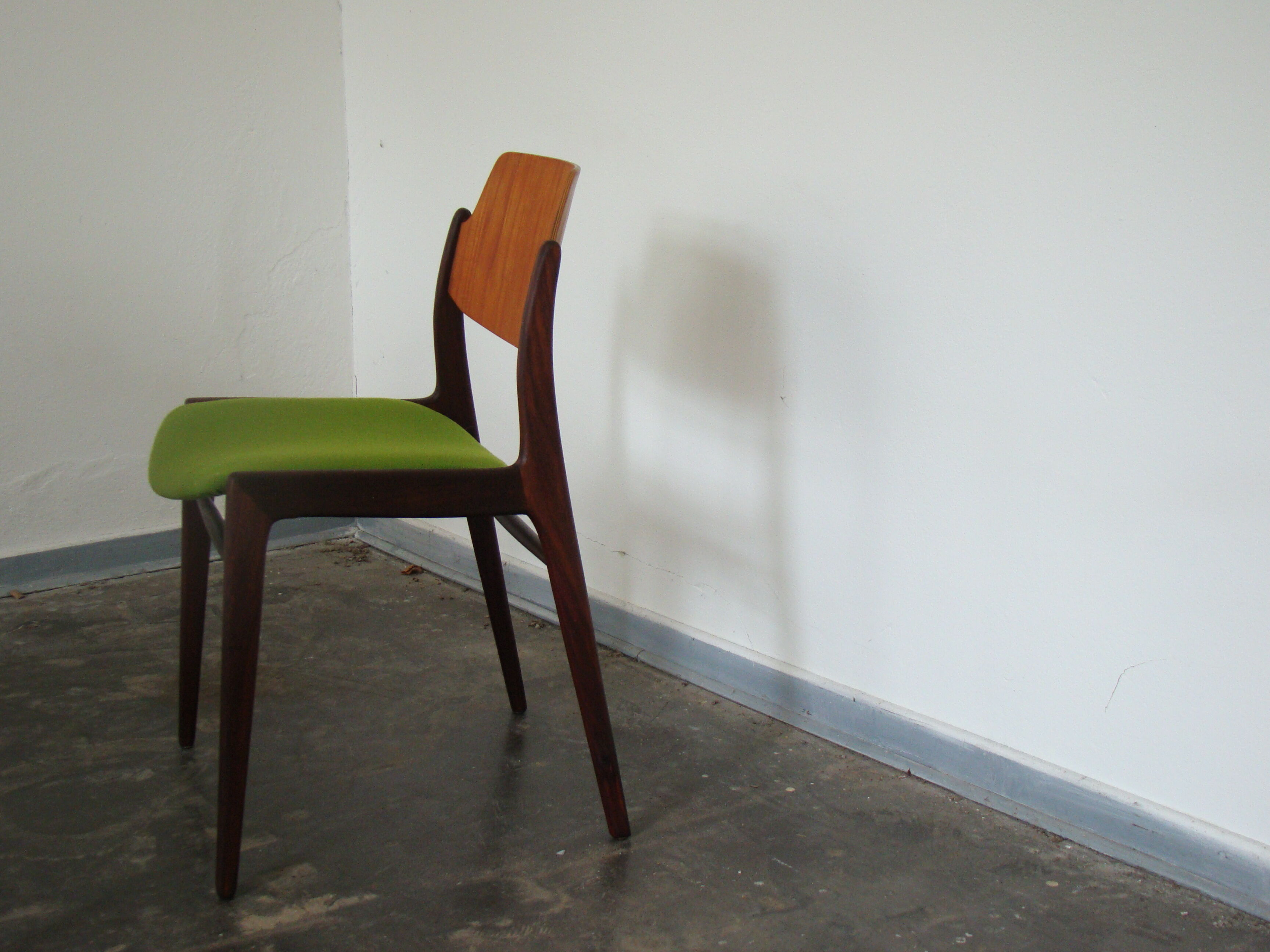 Two vintage teak dining chairs