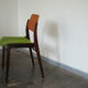 Two vintage teak dining chairs