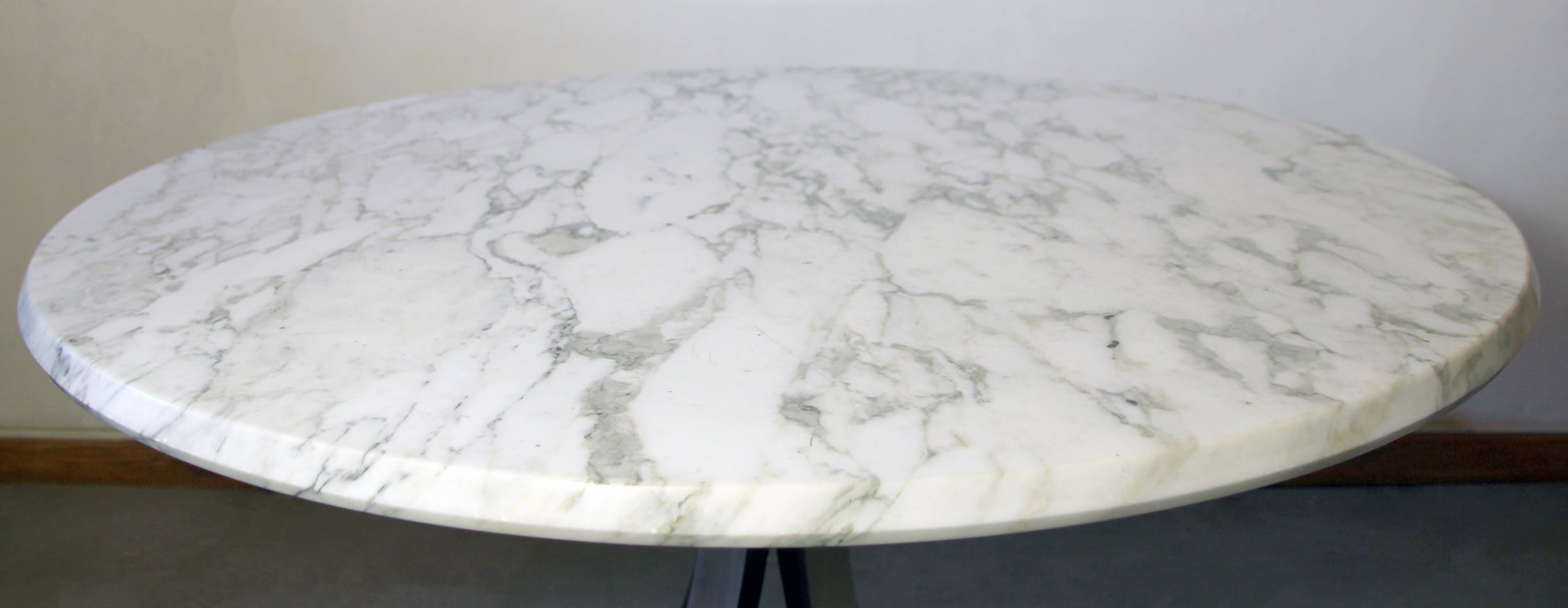 Table T69 in marble by Osvaldo Borsani and Eugenio Gerli published by Tecno