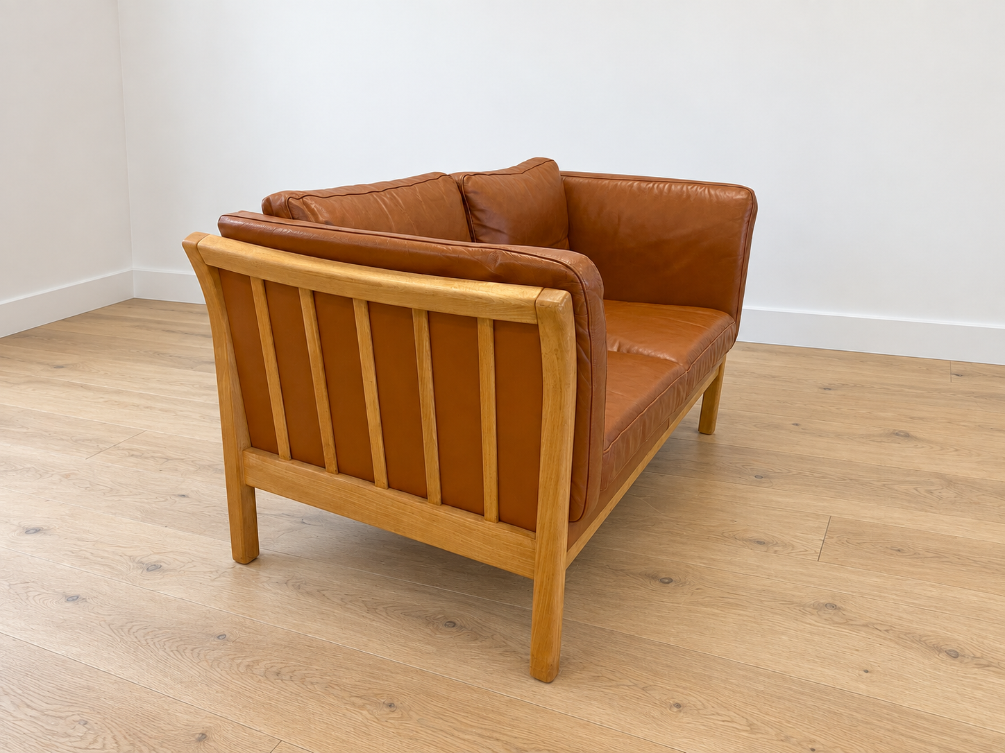 Vintage Danish 2 person sofa in cognac leather with oak frame