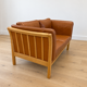 Vintage Danish 2 person sofa in cognac leather with oak frame