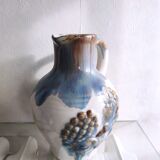 Small ceramic pitcher decorated with grapes