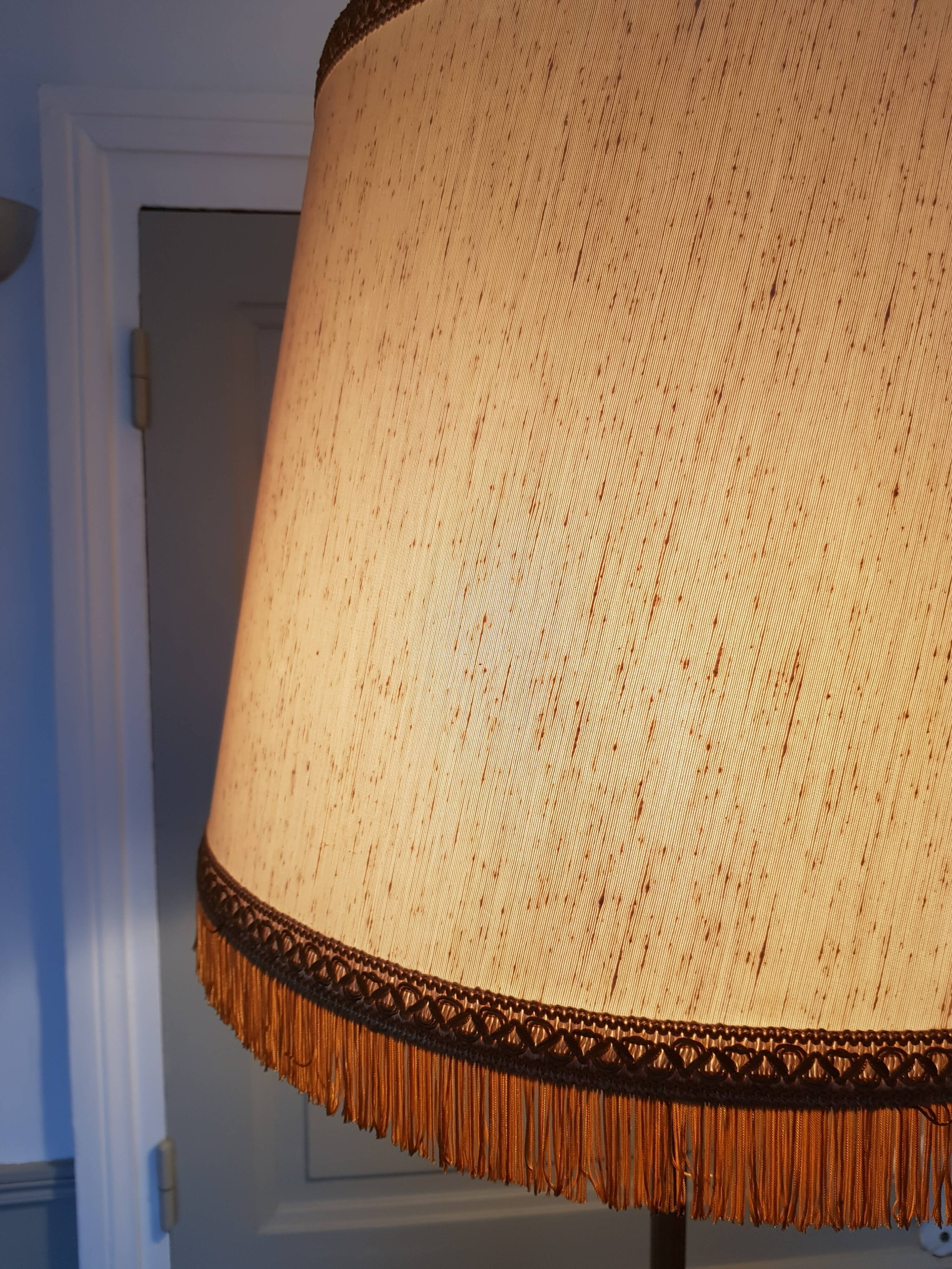 Authentic antique lamppost in gilded brass lampshade in fringed cream fabric