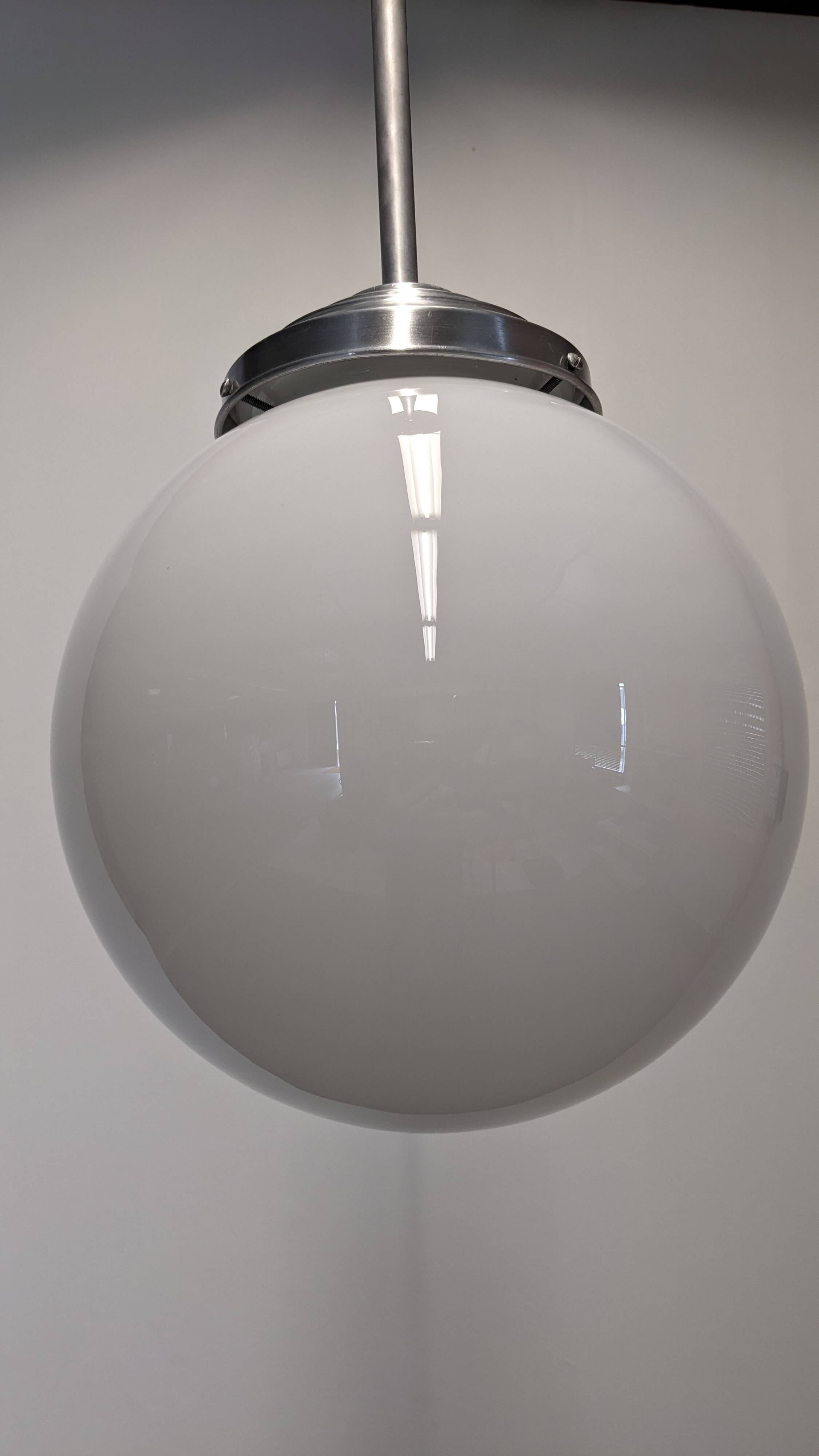 XL Art Deco white opaline suspension light, France circa 1920.