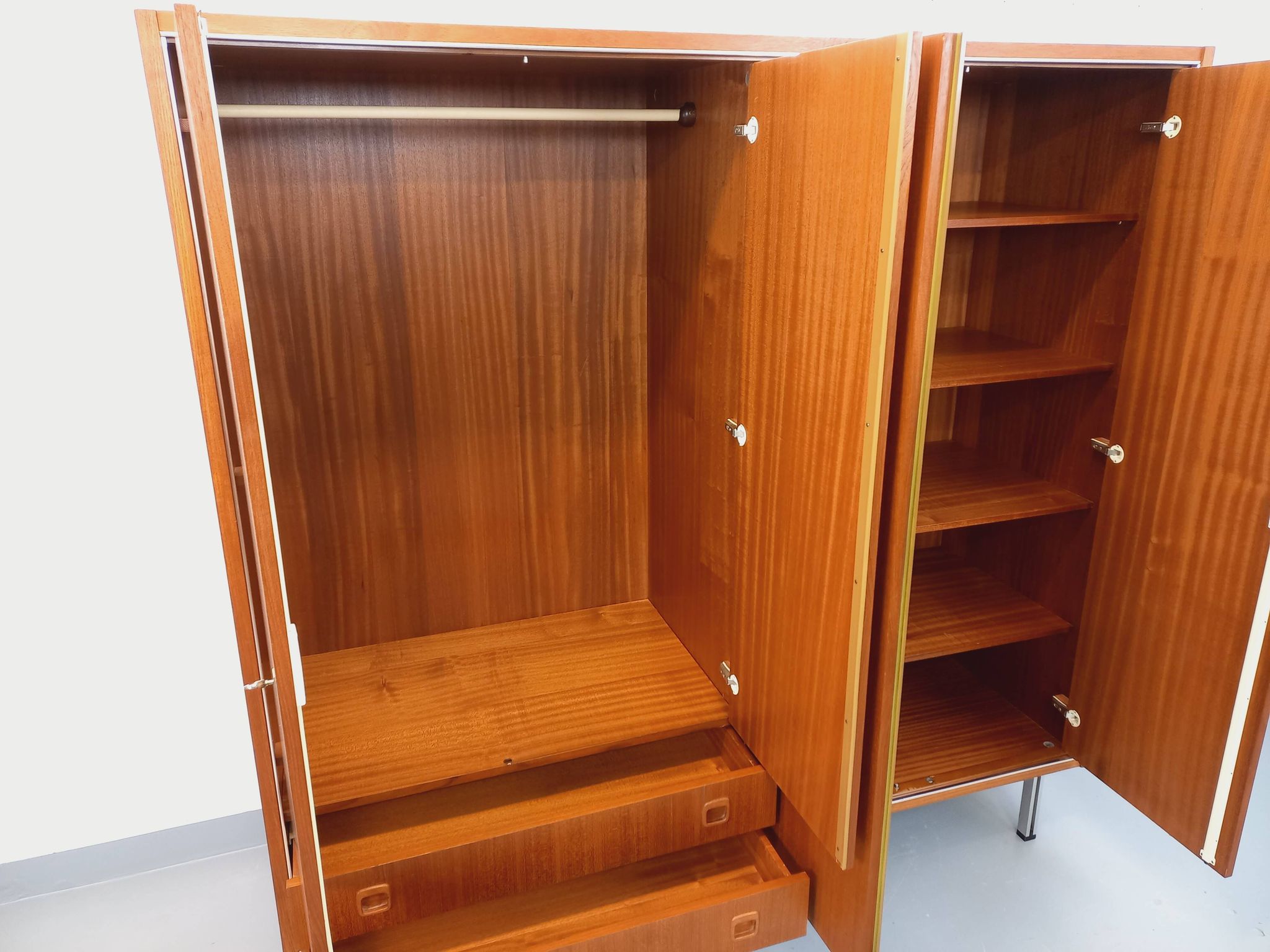 Vintage Scandinavian modernist wardrobe in teak and metal from the 1960s.