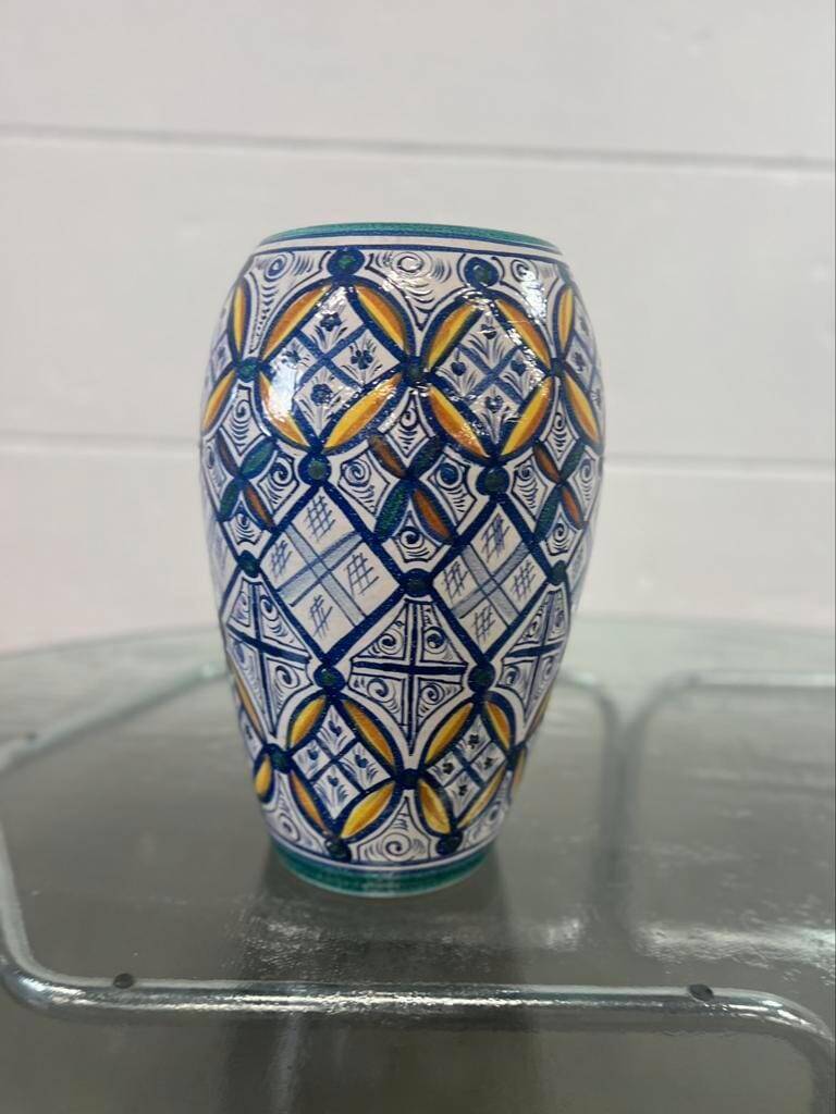 Vintage ceramic vase in ethnic style