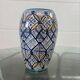 Vintage ceramic vase in ethnic style