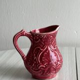 Red ceramic milk jug