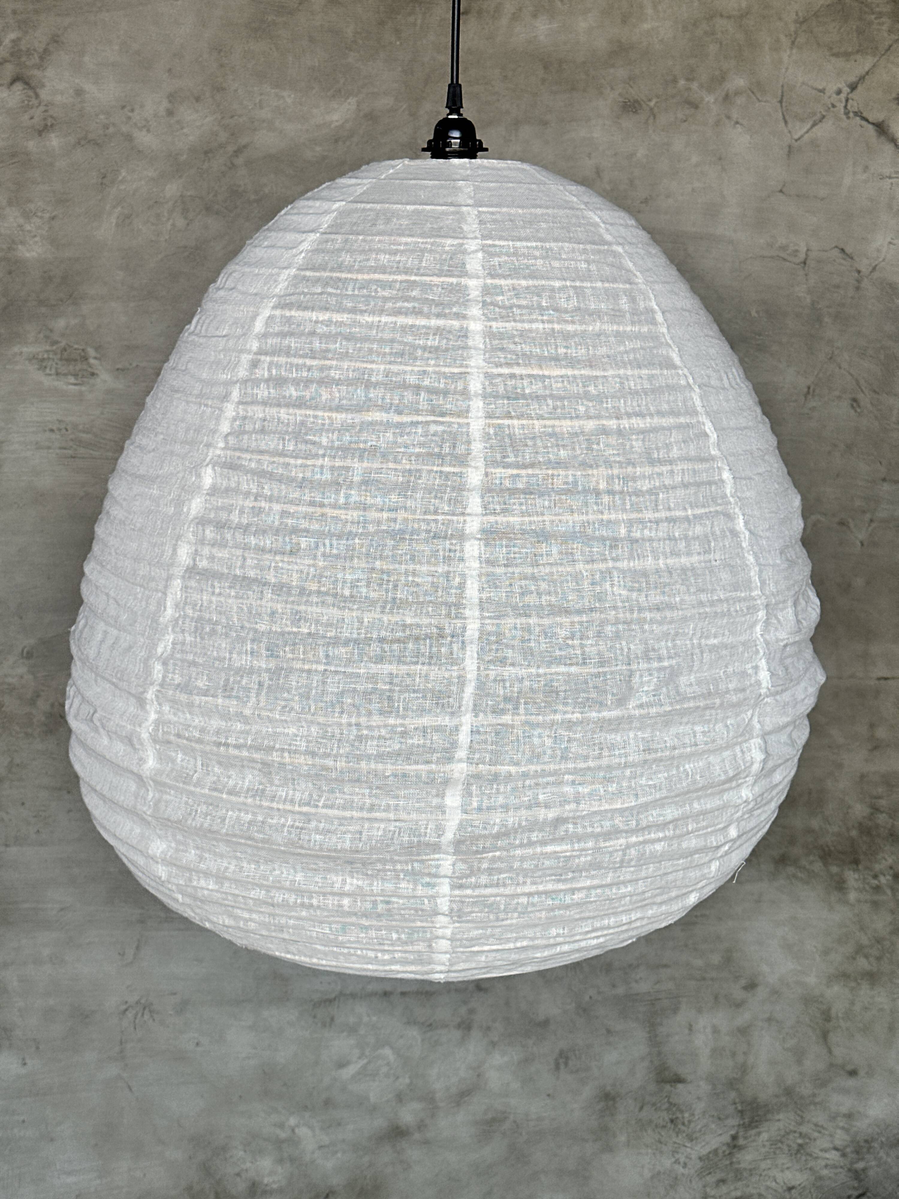 Very large Japanese-style natural rattan and linen pendant light in the shape of a drop H65 D70