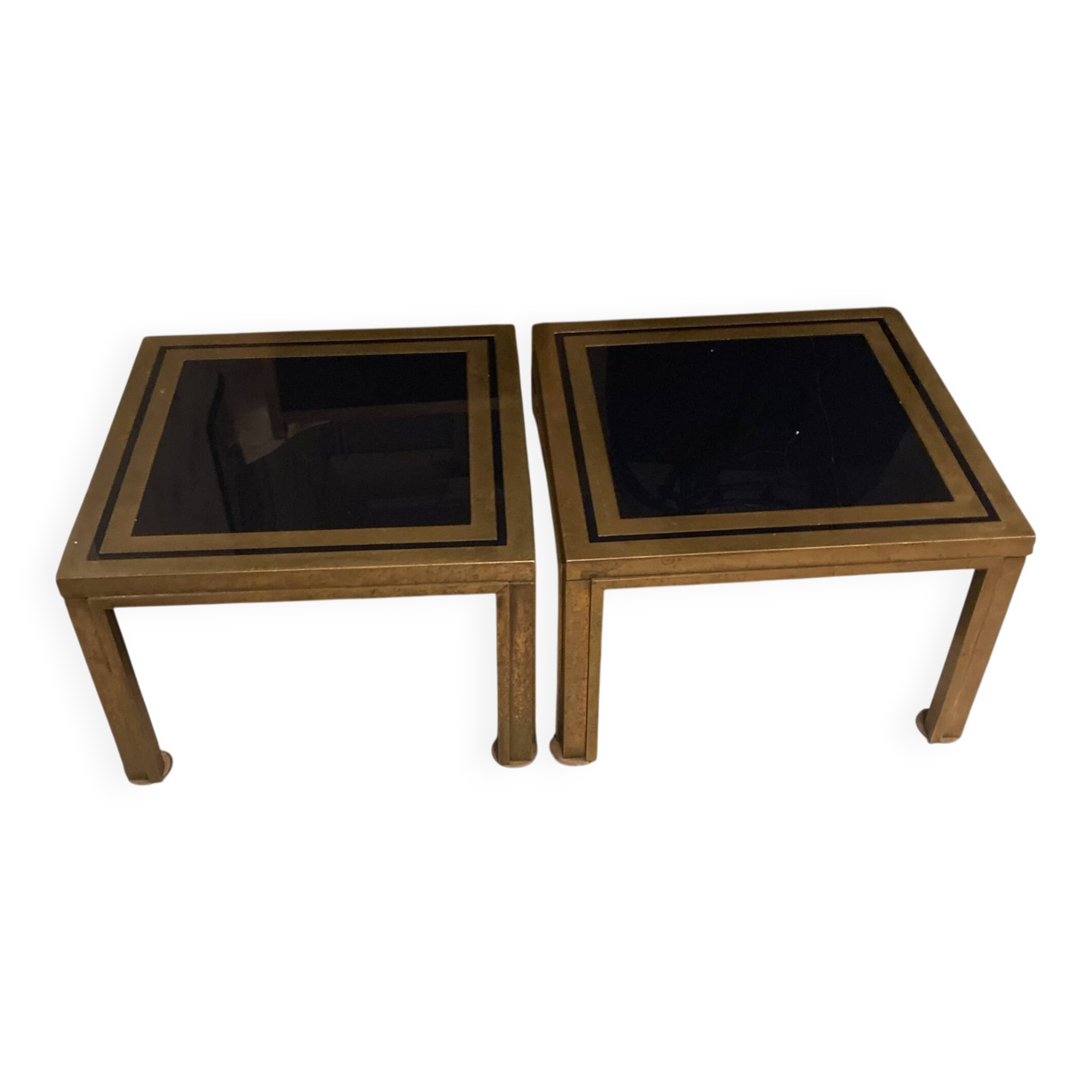 Pair of Romeo Rega side tables in brass and smoked glass, Italy 1970.