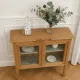 Art Deco sideboard in raw wood with a wax finish, closed by 2 glass doors.
