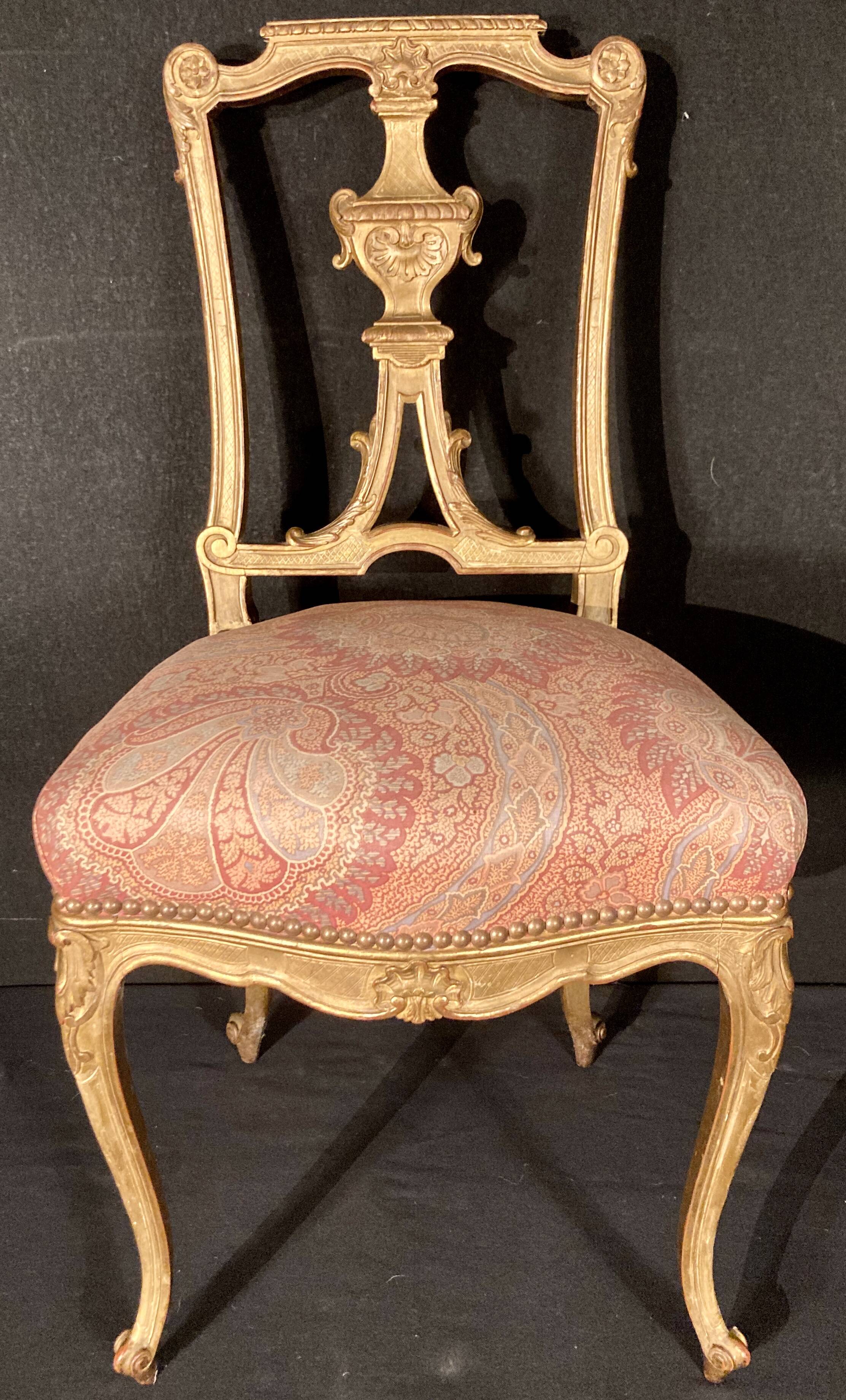 Pair of gilded wooden chairs