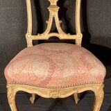 Pair of gilded wooden chairs