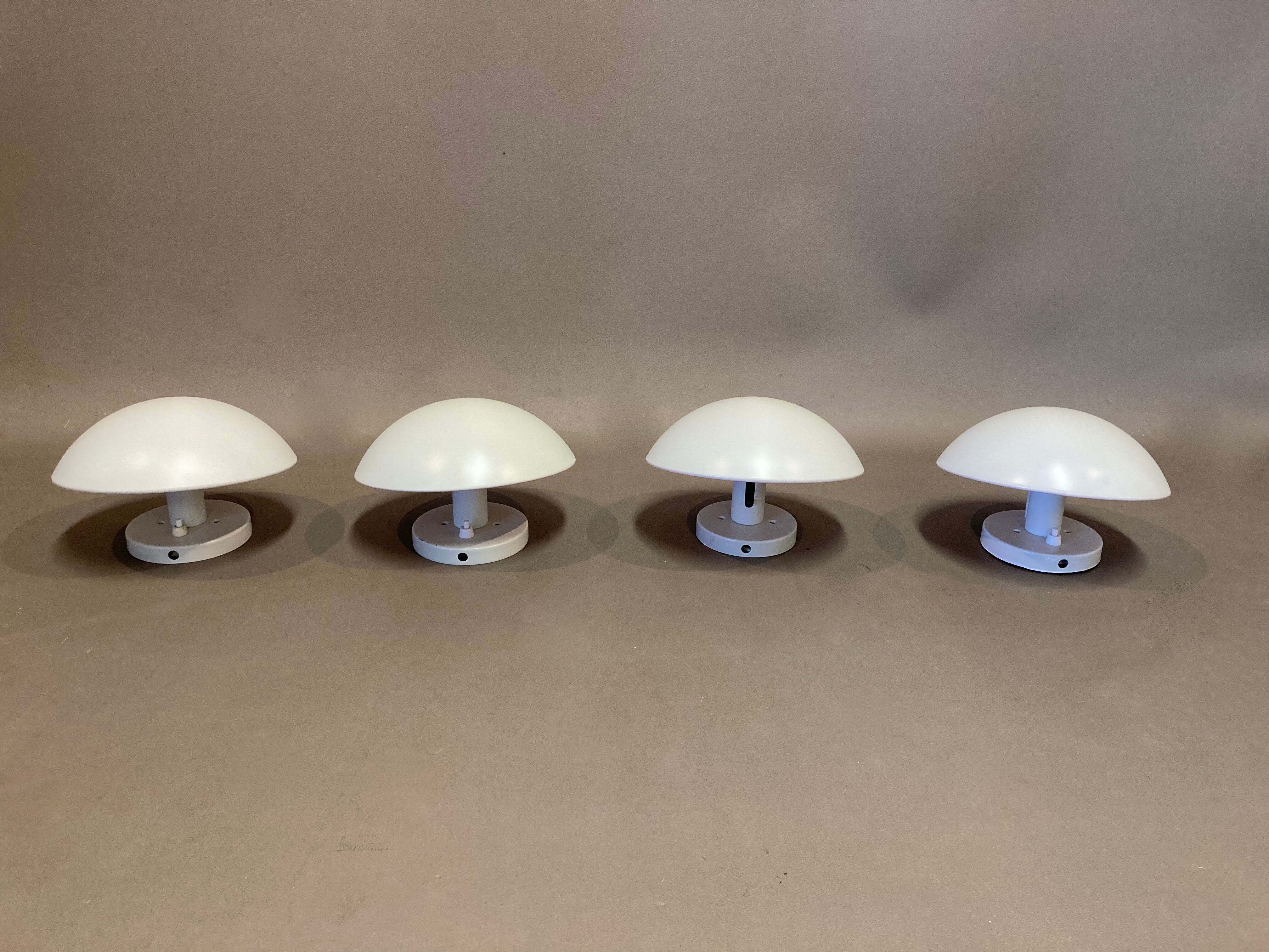 Suite of 4 modular wall lamps "Design Louis Poulsen".