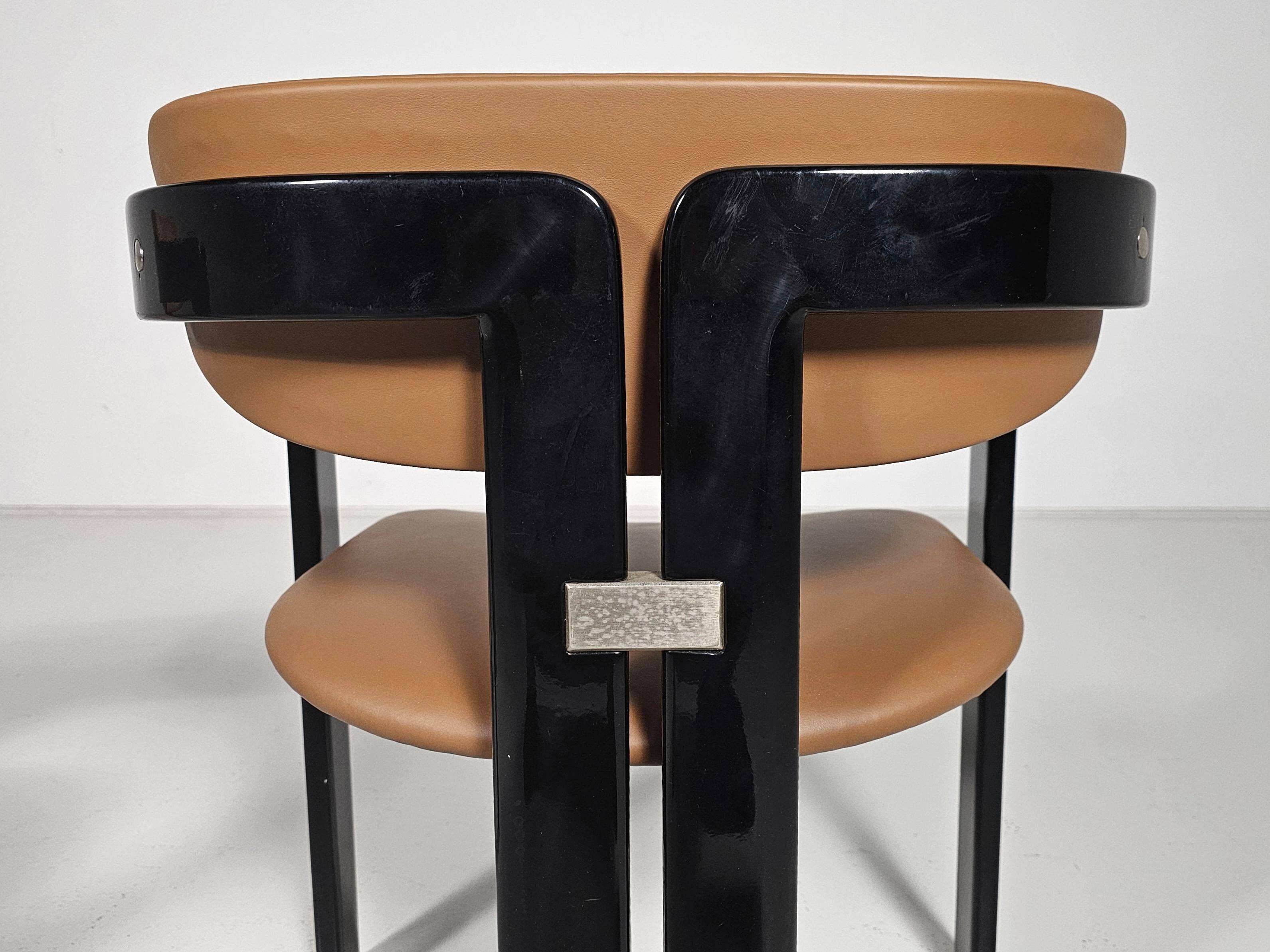Set of two chairs by Augusto Savini, 1960s.