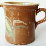 Old pitcher pot in glazed earth