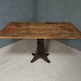 Old table on cast iron machine leg