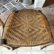 Campaign stool in rattan and wood