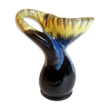 Vase with twisted handle